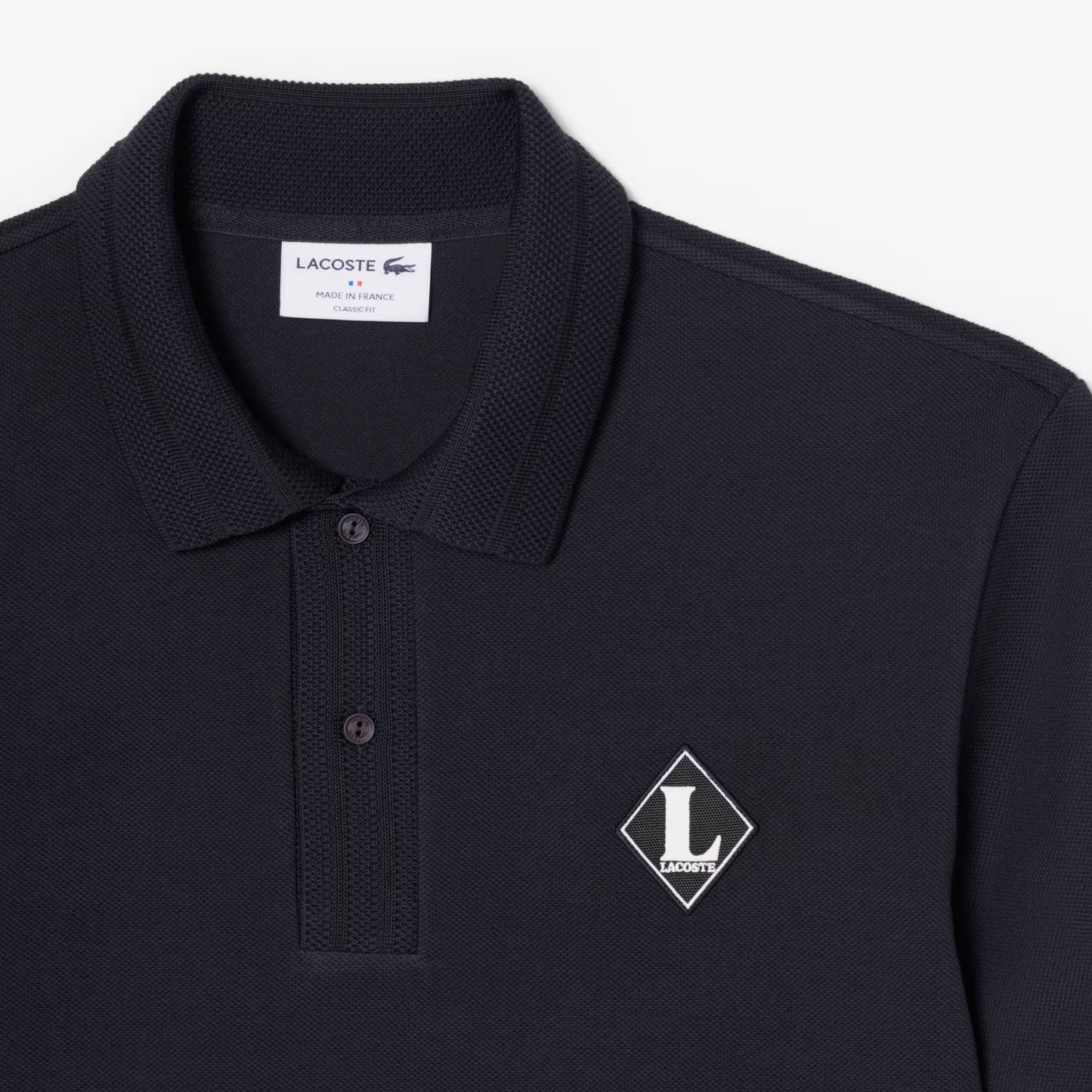Französisches Polo-Shirt mit Badge im klassischen Schnitt